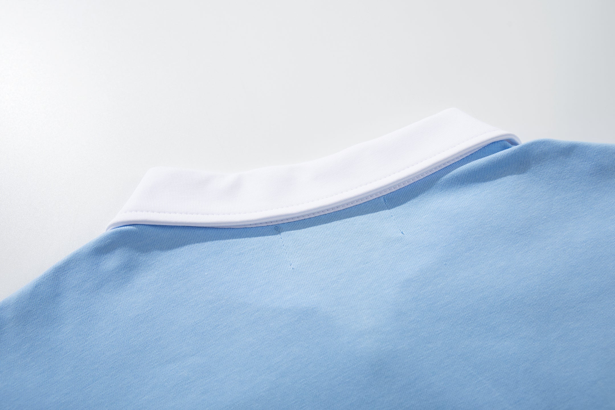 MAJESTIK Half‑Zip Sports Polo Shirt