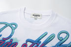 MAJESTIK Tropical Skull Double‑Sided Graphic T‑Shirt