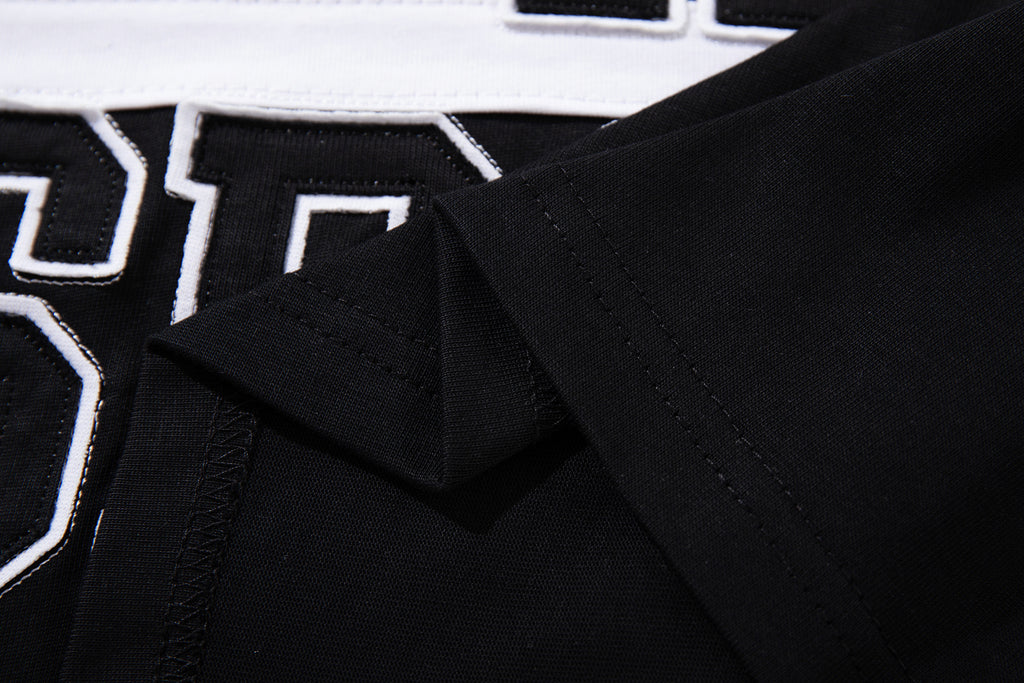 MAJESTIK Sports Embroidered Patch Half‑Zip Black‑White Polo Shirt
