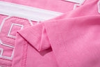 MAJESTIK Sports Patch‑Embroidered Half‑Zip Pink Striped Polo Shirt