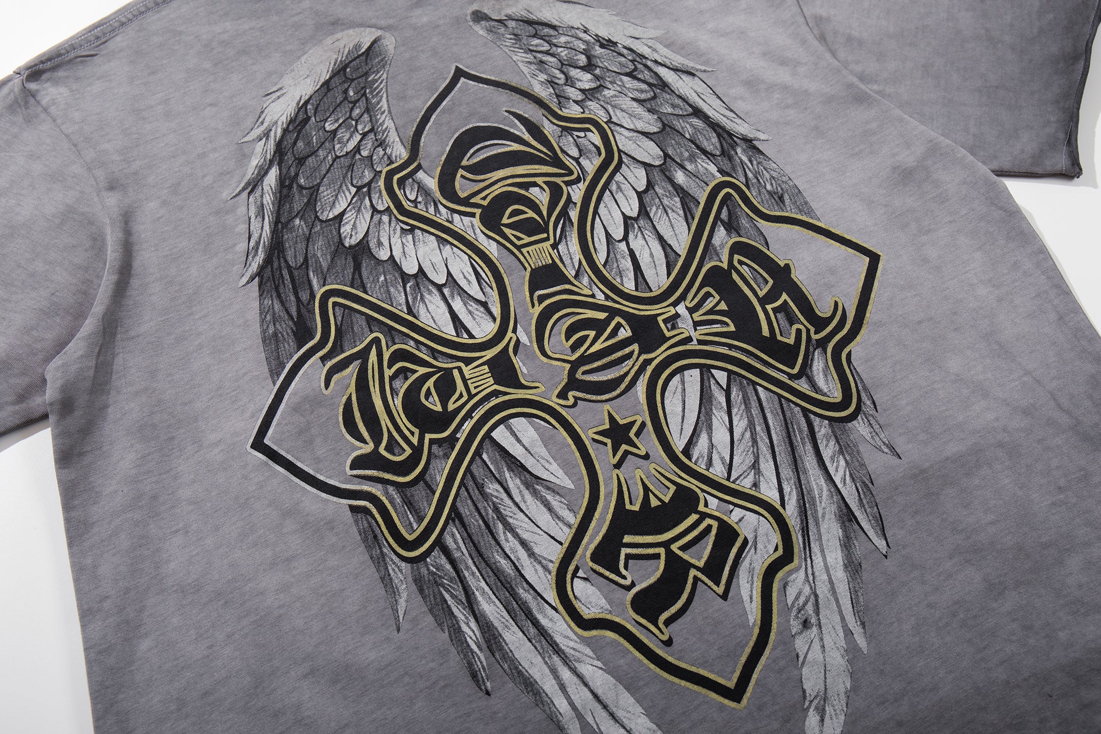 MAJESTIK Relentless Cross Wings Vintage T‑Shirt