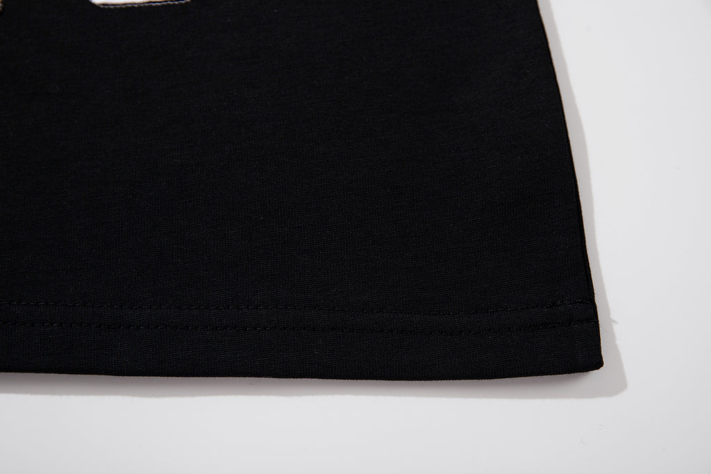 MAJESTIK Sports Embroidered Patch Half‑Zip Black‑White Polo Shirt
