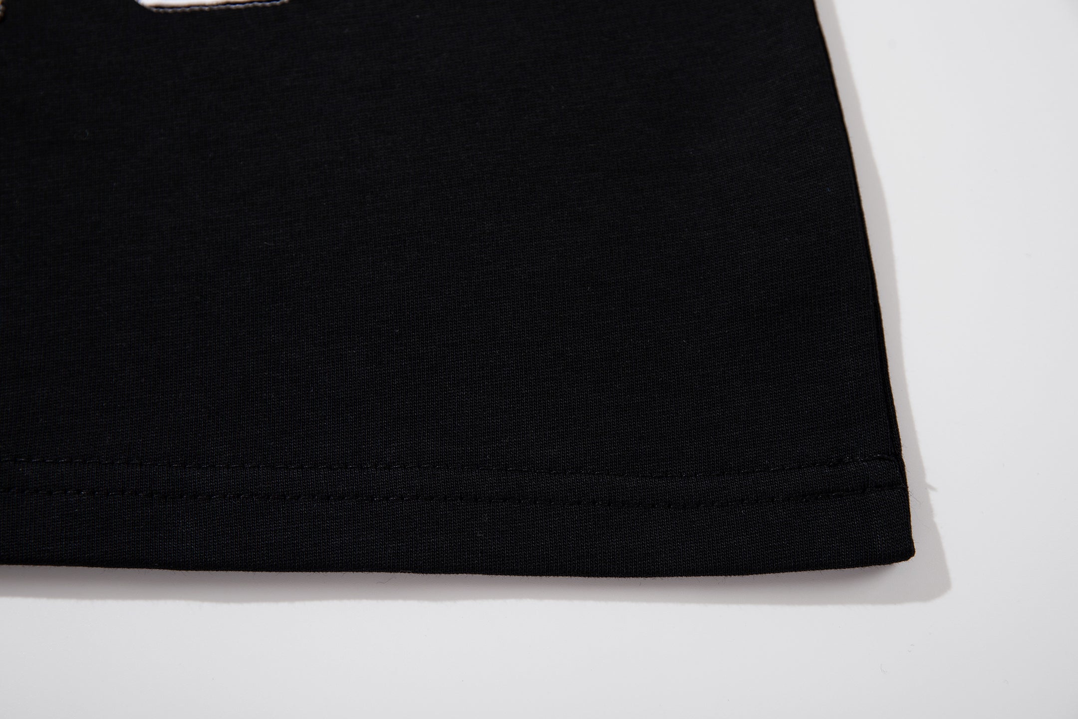 MAJESTIK Sports Embroidered Patch Half‑Zip Black‑White Polo Shirt