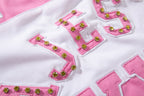 MAJESTIK Sports Patch‑Embroidered Half‑Zip Pink Striped Polo Shirt