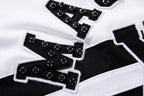 MAJESTIK Sports Embroidered Patch Half‑Zip Black‑White Polo Shirt