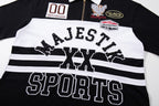 MAJESTIK Sports Embroidered Patch Half‑Zip Black‑White Polo Shirt