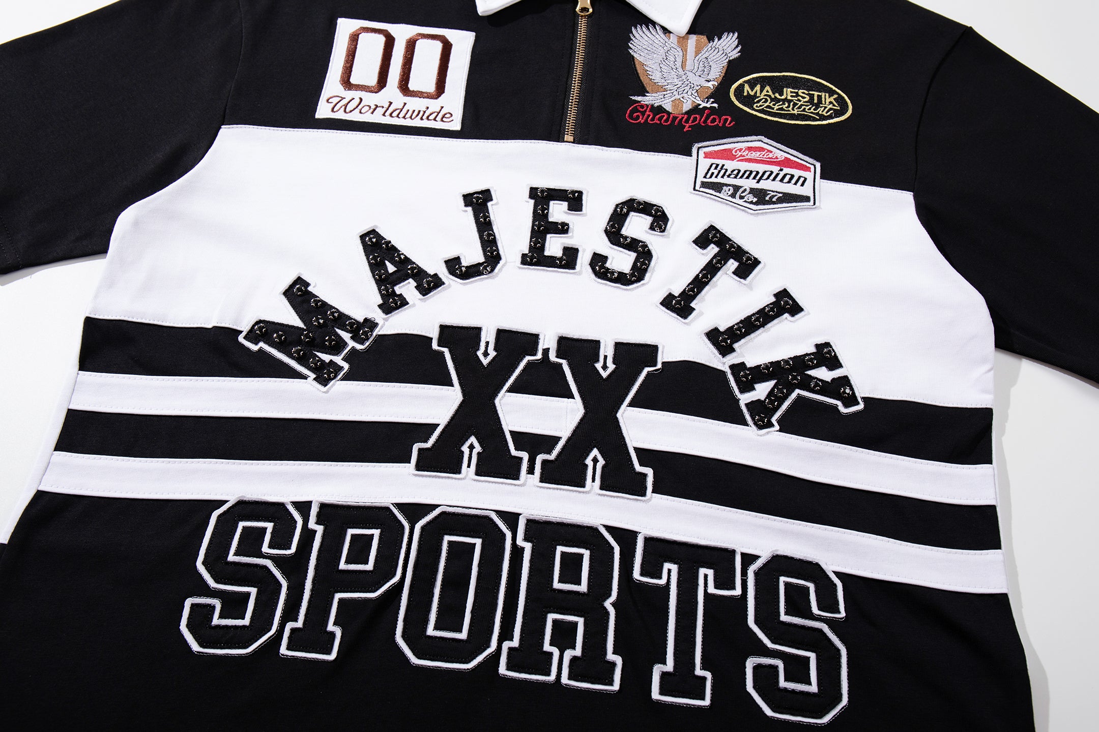 MAJESTIK Sports Embroidered Patch Half‑Zip Black‑White Polo Shirt