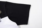MAJESTIK Sports Embroidered Patch Half‑Zip Black‑White Polo Shirt