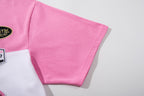 MAJESTIK Sports Patch‑Embroidered Half‑Zip Pink Striped Polo Shirt
