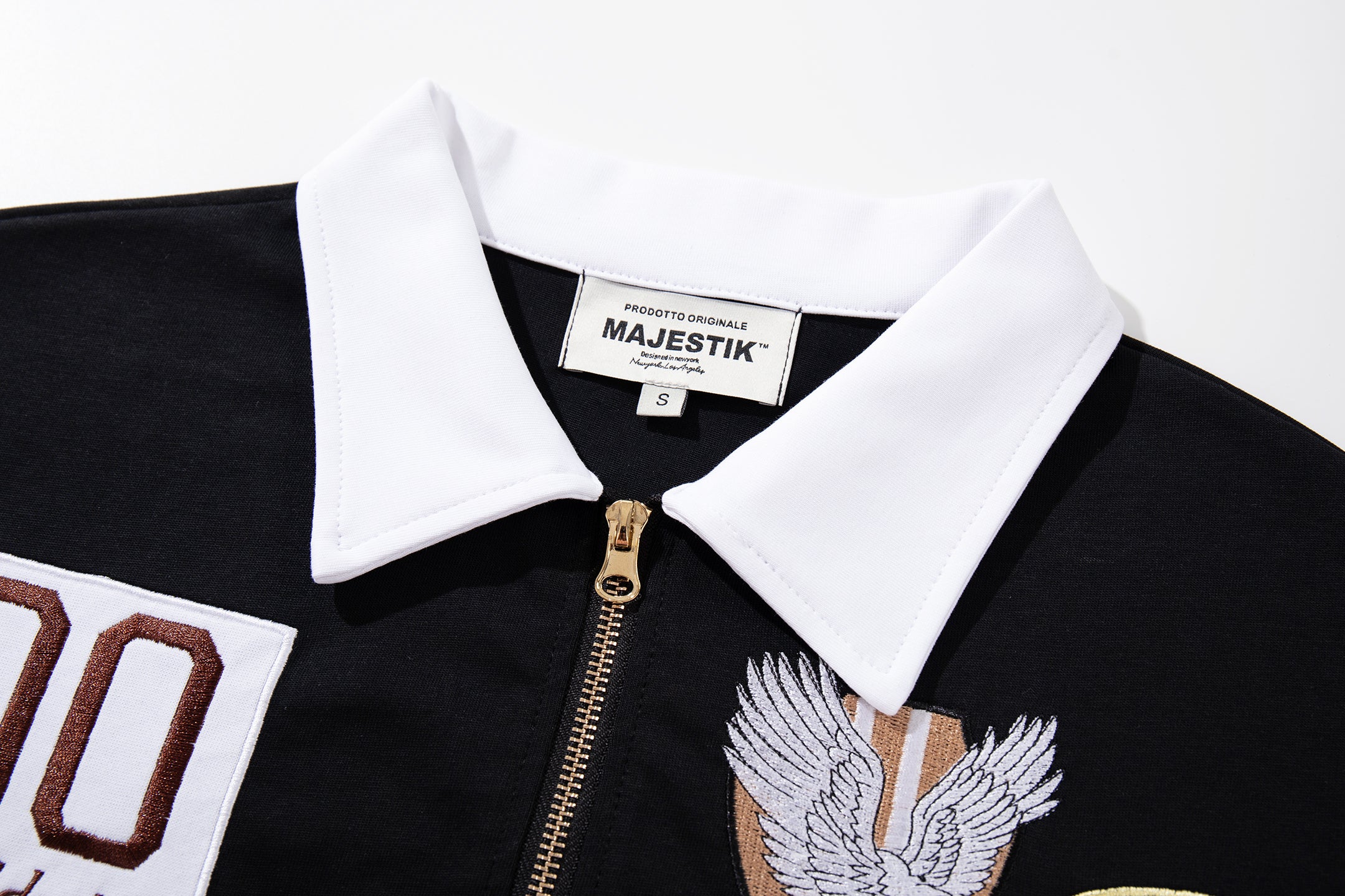 MAJESTIK Sports Embroidered Patch Half‑Zip Black‑White Polo Shirt