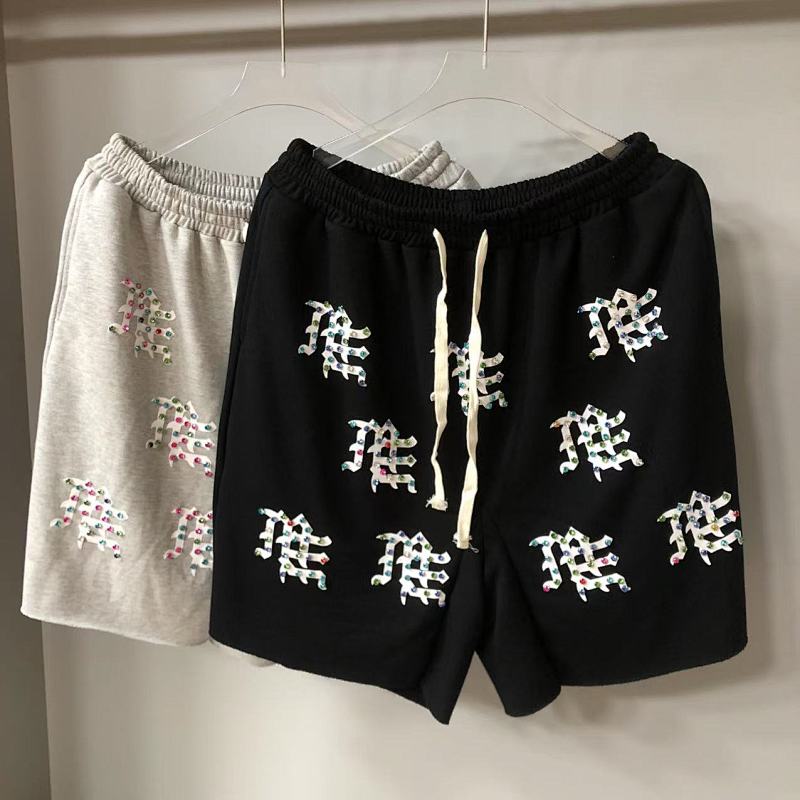MIXED EMOTION All‑Over Rhinestone Logo French Terry Shorts
