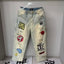 MIXED EMOTION Multi‑Patch Vintage Wash Baggy Cargo Jeans