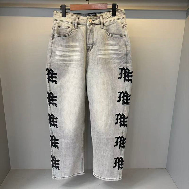 MIXED EMOTION Vertical Gothic‑Logo Washed‑Out Wide‑Leg Jeans Hover Image