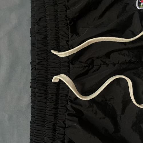 MIXED EMOTION Side‑Striped Rhinestone Logo Nylon Shorts