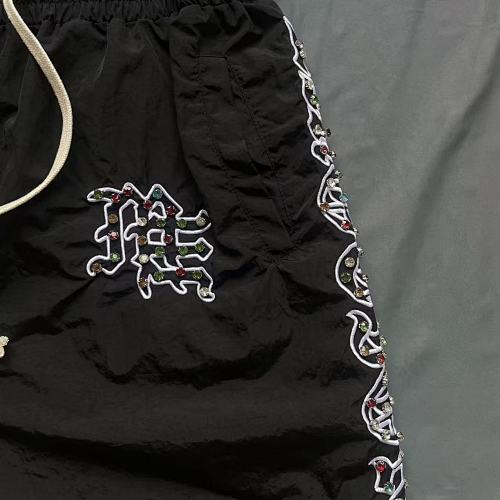 MIXED EMOTION Side‑Striped Rhinestone Logo Nylon Shorts