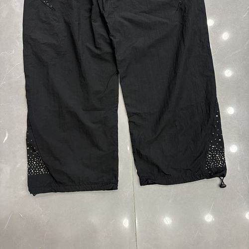 MIXED EMOTION Cross Logo Rhinestone‑Side Wide‑Leg Pants