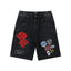 MIXED EMOTION Multi‑Patch Gothic Logo Black Denim Jorts