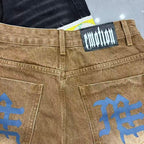 MIXED EMOTION Photo‑Patch Raw‑Hem Denim Shorts