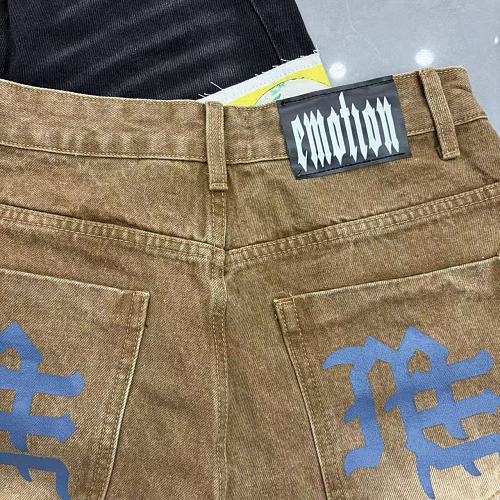 MIXED EMOTION Photo‑Patch Raw‑Hem Denim Shorts
