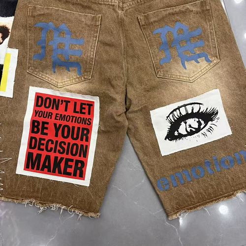 MIXED EMOTION Photo‑Patch Raw‑Hem Denim Shorts