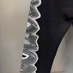 MIXED EMOTION Wing‑Pattern Side Wide‑Leg Sweatpants