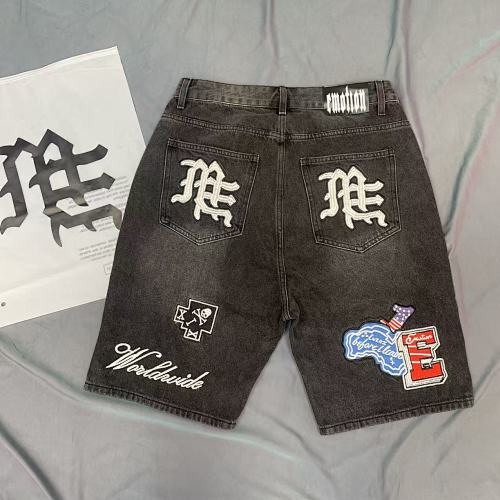 MIXED EMOTION Multi‑Patch Gothic Logo Black Denim Jorts