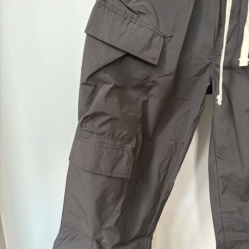 MIXED EMOTION Crest Patch Wide‑Leg Cargo Pants
