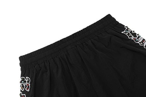 MIXED EMOTION Side‑Striped Rhinestone Logo Nylon Shorts