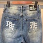 MIXED EMOTION Vertical Gothic‑Logo Cloud‑Wash Wide‑Leg Jeans