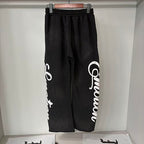 MIXED EMOTION Cursive‑Logo Side Wide‑Leg Sweatpants