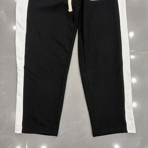 MIXED EMOTION Cross‑Logo Side‑Stripe Black Track Pants