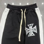 MIXED EMOTION Cross‑Logo Side‑Stripe Black Track Pants