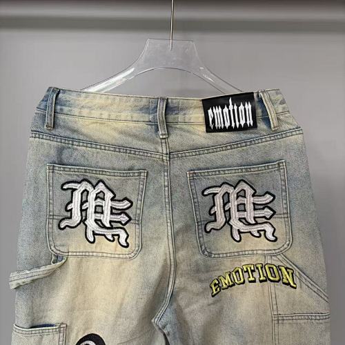 MIXED EMOTION Multi‑Patch Vintage Wash Baggy Cargo Jeans