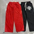 MIXED EMOTION Cross Logo Rhinestone‑Side Wide‑Leg Pants