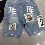MIXED EMOTION Patchwork Distressed Denim Shorts