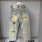 MIXED EMOTION Multi‑Patch Vintage Wash Baggy Cargo Jeans