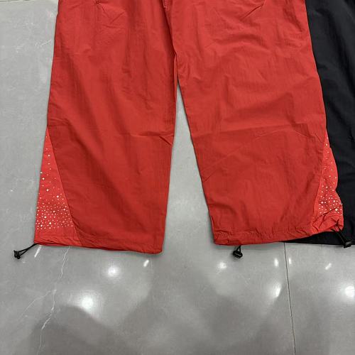 MIXED EMOTION Cross Logo Rhinestone‑Side Wide‑Leg Pants