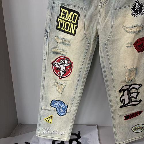 MIXED EMOTION Multi‑Patch Vintage Wash Baggy Cargo Jeans