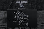MIXED EMOTION Multi‑Patch Gothic Logo Black Denim Jorts