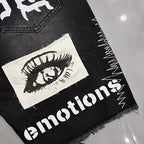 MIXED EMOTION Photo‑Patch Raw‑Hem Denim Shorts