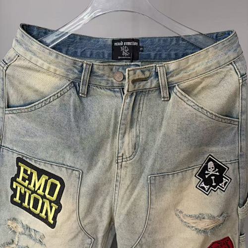 MIXED EMOTION Multi‑Patch Vintage Wash Baggy Cargo Jeans