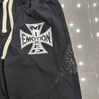 MIXED EMOTION Cross Logo Rhinestone‑Side Wide‑Leg Pants
