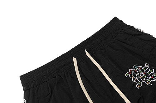 MIXED EMOTION Side‑Striped Rhinestone Logo Nylon Shorts