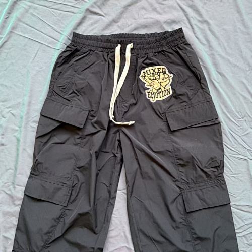 MIXED EMOTION Crest Patch Wide‑Leg Cargo Pants