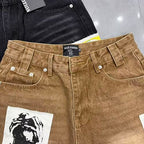 MIXED EMOTION Photo‑Patch Raw‑Hem Denim Shorts