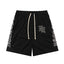 MIXED EMOTION Side‑Striped Rhinestone Logo Nylon Shorts