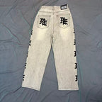 MIXED EMOTION Vertical Gothic‑Logo Washed‑Out Wide‑Leg Jeans