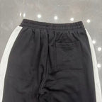 MIXED EMOTION Cross‑Logo Side‑Stripe Black Track Pants
