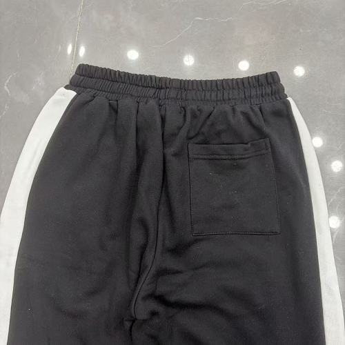 MIXED EMOTION Cross‑Logo Side‑Stripe Black Track Pants